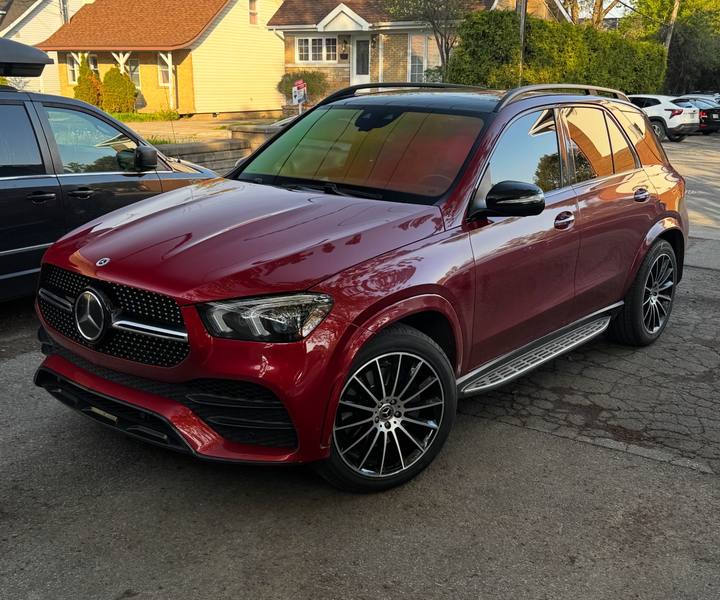Red Mercedes-Benz GLE freshly detailed, with a deep gloss finish