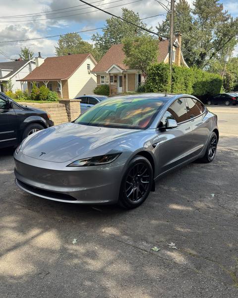 Grey Tesla Model 3 with window tint