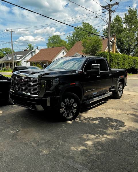 Black GMC Sierra Denali after chrome delete